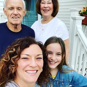 Donald and Brooke smiling with family